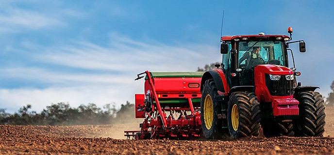Tractor and agricultural field